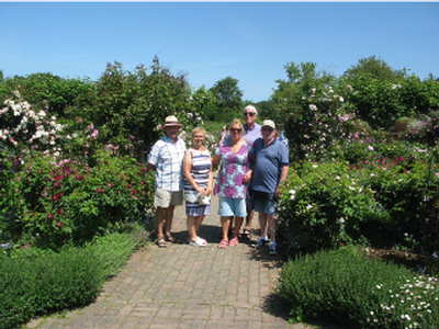 Members stood in the gardens